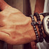 Lava stone bracelet with skull charm for men