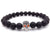 Lava stone bracelet with skull charm for men