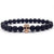 Lava stone bracelet with skull charm for men